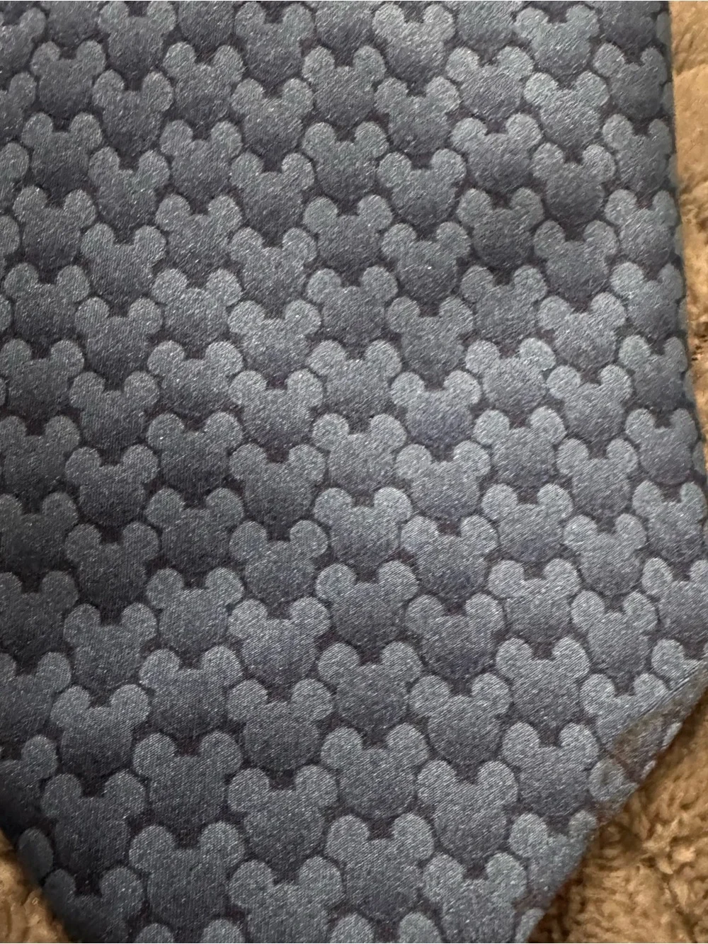 Walt Disney World Mickey Mouse Tie. Navy with subtle Mickey Mouse design.
